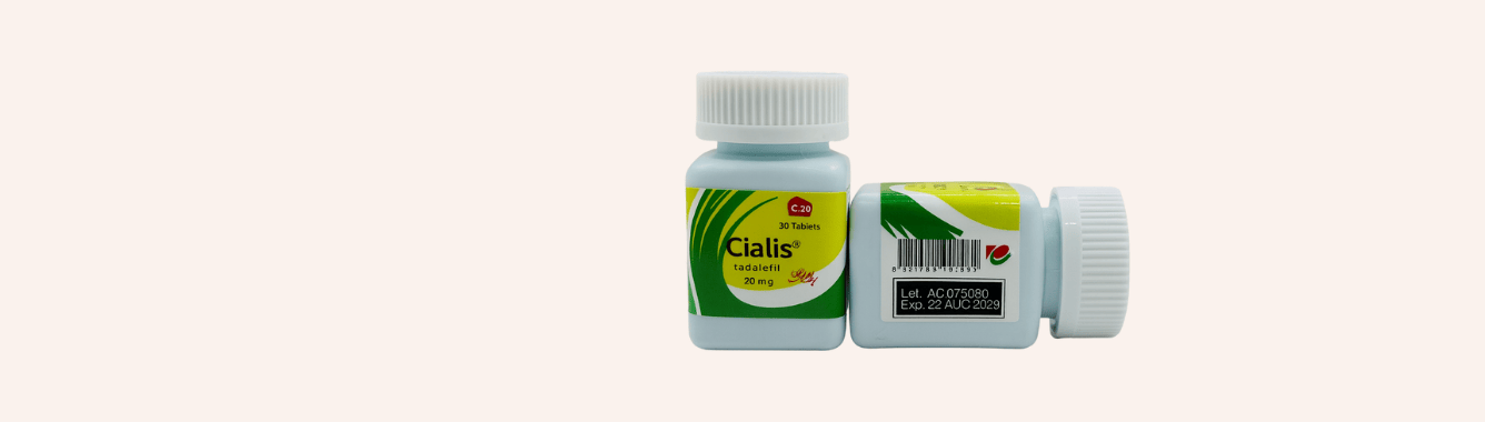 Two Cialis 20mg tadalafil bottles showing front label and expiry details on a light background